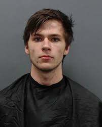 Two men arrested for business break-in, stolen weapons possession