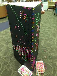 A Peg Board Design Station Made From Peg Board Foam Insulation Golf Tees And Zip Ties Makerspace Library Art Classroom Library Activities