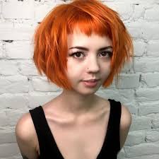 Your short hair doesn't need to look boring. Short Choppy Bob With Micro Bangs And Messy Straight Texture On Fiery Sunset Orange Colored Hair The Latest Hairstyles For Men And Women 2020 Hairstyleology
