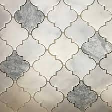 The backsplash gets along very well with the kitchen hood that looks so grand. This Would Be A Bit Of A Splurge Item But It Would Look Beautiful Lantern Arabesque Mosaic Tile Arabesque Mosaic Tiles Marble Polishing Bathroom Floor Tiles