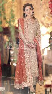 Nowadays pakistani wedding dresses usually like to wear long heavy shirts with simple lehenga or long kaliyan/panel frocks. Grooms Sister Pakistani Dress Design Pakistani Wedding Dresses Pakistan Dress