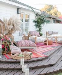 Beautiful Raised Patio Deck With Layered Pink Rugs And Floor Cushions Home Home Decor Bohemian Patio
