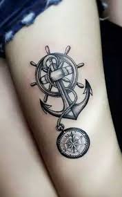 You have various elements of the ship at sea. Women S Anchor And Compass Tattoo Novocom Top