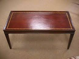 If you have a material of choice, look through a wide range of tables in different materials like marble, glass, wood, and metal. 1950 S Vintage Leather Top Coffee Table Mar 23 2004 Auctions Neapolitan In Fl Leather Top Coffee Table Antique Coffee Tables Coffee Table