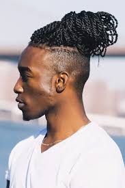 Man bun hairstyle with temple fade. Wondering How To Make Your Man Bun Rock Read This Menshaircuts