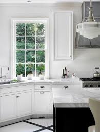 Black appliances look great with painted gray cabinets. Black And White Painted Kitchen Floor Design Ideas