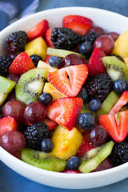 Grilled pineapple split sundae with cherry sauce. Fruit Salad Best Easy Recipe