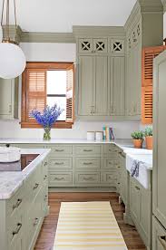 Choosing the right paint finish for kitchen cabinets is important since it affects how durable your cabinets will be in the long run. Before And After A Kitchen Well Done Kitchen Cabinets Painted Grey Green Kitchen Cabinets Tall Kitchen Cabinets
