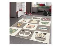 Meuble de rangement en bois et blanc et tapis bohème dans la chambre de jeune fille. Tapis Enfant 200x200 Carre Cm Carre Zoo Too Gris Chambre Adapte Au Chauffage Par Le Sol Vente De Unamourdetapis Conforama