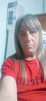 Phil Claudio González added a new...