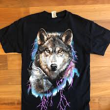 The iconic british brand we all know and love is settling in nicely to its new digs at asos. Vintage Wolf T Shirt With Purple Depop