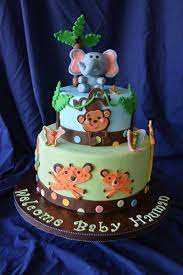 Simply Sweet By Helen Fisher Price Animal Safari Baby Shower Cake Safari Baby Shower Cake Baby Shower Cakes Baby Shower