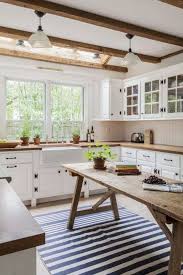 This farmhouse kitchen's black colour usage hits the design! 12 Gorgeous Farmhouse Kitchen Cabinets Design Ideas