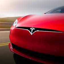 It is also the cross section of a part of an electric motor  1 Meaning Behind The Tesla Logo George Herald