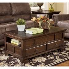 With a handy spring loaded mechanism, it raises the tabletop to you. Coffee And Cocktail Tables