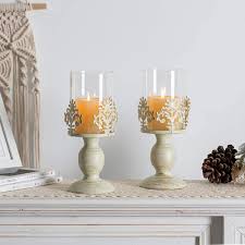 11 candle sconces that create the coziest atmosphere ever. L L Nuptio Pcs Of 2 Vintage Metal Pillar Candle Holder Antique Hurricane Candlestick With Glass Screen Cover Accent Display For Home Wedding Candlelight Dinner Decoration Candlestick Holders Home Kitchen Brilliantpala Org