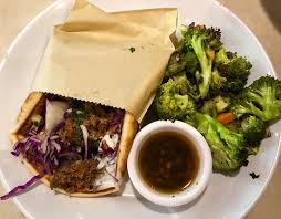 (and local ones, too!) the chain just launched a new runners' menu that features healthy, flavorful dishes to help you fuel. Lamb Pita With Roasted Vegetables Picture Of Zoes Kitchen The Woodlands Tripadvisor