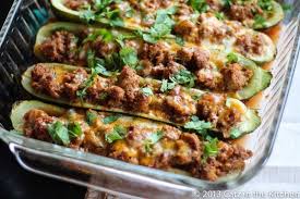 These taco stuffed zucchini boats are a tasty paleo, gluten free, easy dinner that is a great healthy meal prep dinner for beginners. Taco Stuffed Zucchini Boats Recipe Advocare Recipes Recipes Food