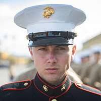 A U.S. Marine participates in a retirement ceremony