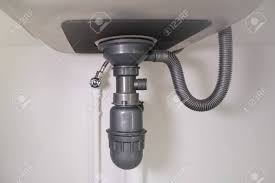 Use salt and boiling water after removing as much standing water from the sink as possible, pour about a half a cup (½ cup) of table salt down the drain. Water Drain Pipe Under Kitchen Sink And Faucet Stock Photo Picture And Royalty Free Image Image 154338489