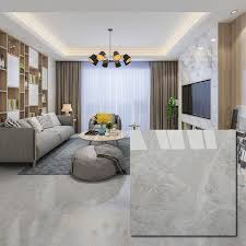 Hi, i am in the dilemma of choosing between tile and wood floor too. Grey 600 X 600mm Polished Ceramic Floor Tile Grey Tiles Living Room Tile Floor Living Room Living Room Tiles