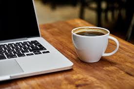 A long low table, often placed before a sofa. Royalty Free Photo Selective Focus Photography Of Teacup With Coffee On Table Near Macbook Pro Pickpik