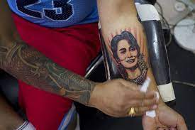 Aung San Suu Kyi Supporters Get Tattoos Of Her Face Tattoos Face San