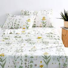 Flannel bedding sheets feature the same soft, slightly fuzzy texture of flannel clothing. Amazon Com Wake In Cloud Botanical Sheet Set Yellow Flowers And Green Leaves Floral Garden Pattern Printed On White Soft Microfiber Bedding 4pcs Queen Size Kitchen Dining