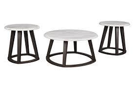 With a walnut top, solid edges and a black steel base, let this coffee table catch the eye of any wandering guest. Luvoni Table Set Of 3 Ashley Furniture Homestore Round Coffee Table Sets Table Settings Round Coffee Table