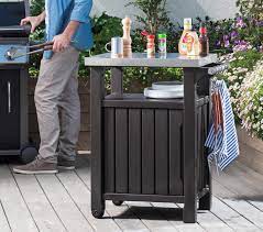 Its stainless steel worktop comes in handy for preparing food and drinks and will give you plenty of extra serving space when you're hosting a barbecue or outdoor party. Keter Unity Small Bbq Storage Work Table