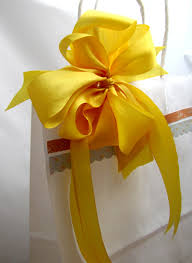 Decorators spend a lot of time and money selecting trims for workrooms to sew on pillows and curtains that will complement various colors and patterns work with ribbon that's 1 to 1.5 inches thick. Making Your Own Beautiful Gift Bag Bow Online Ribbon May Arts Ribbon