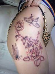 Pin By Fee Millz On Beautifully Tattooed Butterfly Tattoos For Women Thigh Tattoo Butterfly With Flowers Tattoo