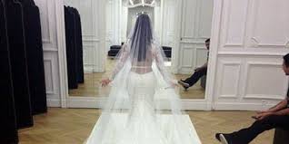 The american socialite, who is engaged to marry nba star kris kardashian went on to say that she is confident the designer will create the perfect look for her impending nuptials. Kim Kardashian Wedding Dress Fitting Kim Kardashian Naked