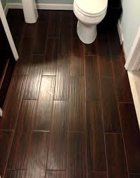 This Stuff Is Awesome Tile That Looks Like Wood Wood Look Tile So Want This For My Kitchen Or My Bathroom Wood Look Tile Flooring Home Remodeling
