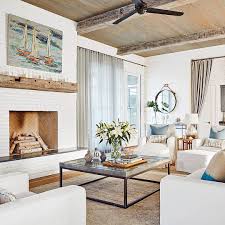 This Florida Beach House Perfectly Mixes Urban Flair And Rustic Charm In 2020 Beach House Living Room Florida Beach House Beach House Interior