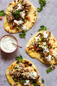 Chicken Gyros The Best Chicken Gyros Served With Simple Cucumber Tomato Salad And Creamy Tzatziki Sauce Littlebro Chicken Gyro Recipe Greek Recipes Recipes