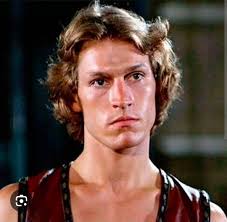 The image presents Hun (the man with crossed hands) attending a Purple  Dragons meeting, a gang that was now working for the Foot Clan and wanted  them all to know there was