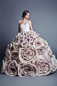 A marital dress, typically all white and decorated with frills and veils. Sculptural Fashion Voluminous Dress With Giant Fabric Roses Skirt 3d Flower Fashion Wearable Art Jean Louis Sabaji Gowns Dresses Ball Gowns