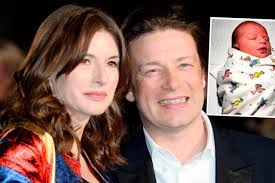 Jamie and Jools Oliver introduce their fifth child as they pose for the  first time as a family of seven