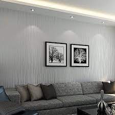 Using pops of red and blue upon black and grey, this modern eclectic living room is coloured under baubles. 20 Living Rooms With Beautiful Use Of The Color Grey Grey Wallpaper Living Room Wallpaper Living Room Living Room Wall Wallpaper