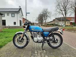 Image result for Nice Blue 1977 Honda