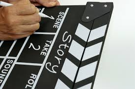 Focus the hand is holding clapperboard or movie slate black color and marker  pen. Cinema industry concept. 26712945 Stock Photo at Vecteezy