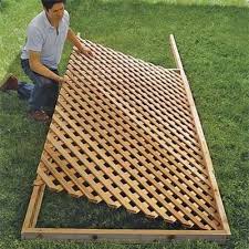 How To Build Lattice Fence Panels Set The Lattice In Place How To Build A Trellis This Old House Building A Trellis Lattice Fence Panels Backyard Privacy