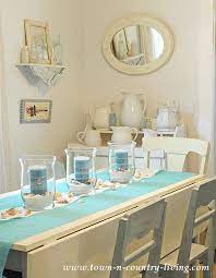 How To Create A Summer Coastal Centerpiece Town Country Living Dining Room Table Centerpieces Summer Centerpieces Dining Room Decor