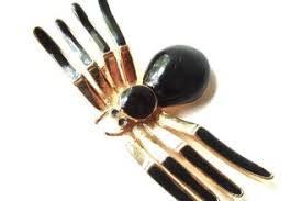 From my search it looks like it's maybe worth a bunch of chaos orbs? Faberge Spider Brooch Biological Science Picture Directory Pulpbits Net