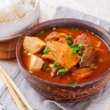 Add pork and onion slice 2 green onions diagonally and add them to the pot. Korean Food Kimchi Chigae Corian House