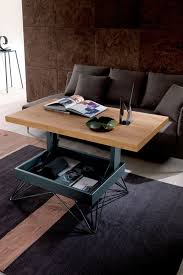 Table à manger gain de place. 10 Tables Basses Relevables Pour Optimiser L Espace Dans Votre Salon Table Basse Relevable Table Basse Transformable Table Basse