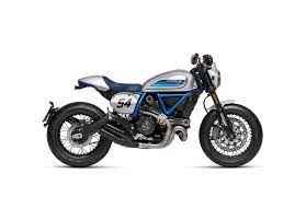 A 1979 yamaha sr500 single cylinder, with some bare metal bodywork, hand built leather cafe seat, and rear tail cowling. Cafe Racer Scrambler Ducati
