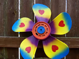 There's something so cool about having an unexpected pop of color in the ceiling, so let me show you how i made this happen with a couple of spray paint cans. Painted Box Fan Blade Made Into A Flower Will Put On A Pole With Large Long Nail With Washers On Each Side And Make S Ceiling Fan Art Painted Box Fan