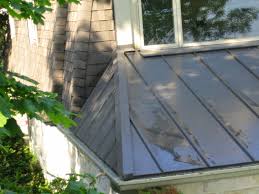 My house has a standing seam metal hip roof on both the main house and an addition that we put on about 15 years ago. Metal Roof Hip Section Mackey Metal Roofing